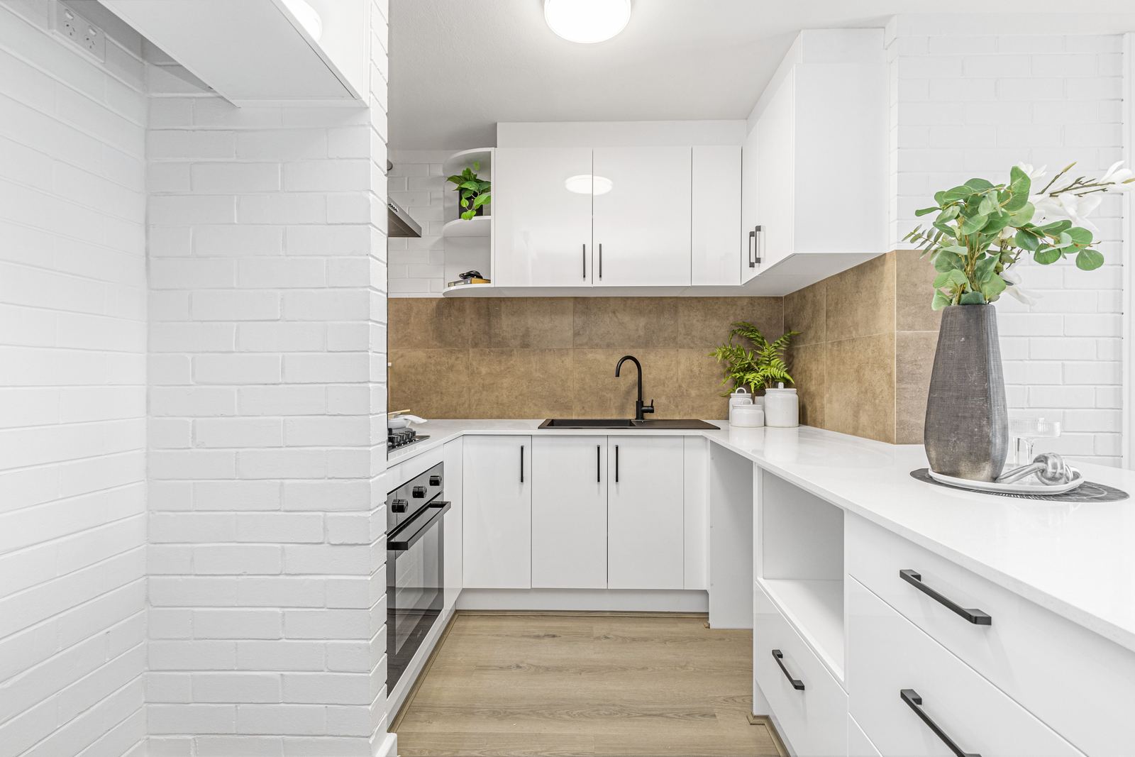 Vacant kitchen prepared for sale in a West Perth apartment